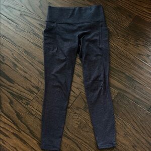 Athleta navy salutation stash pocket soft luxe tight